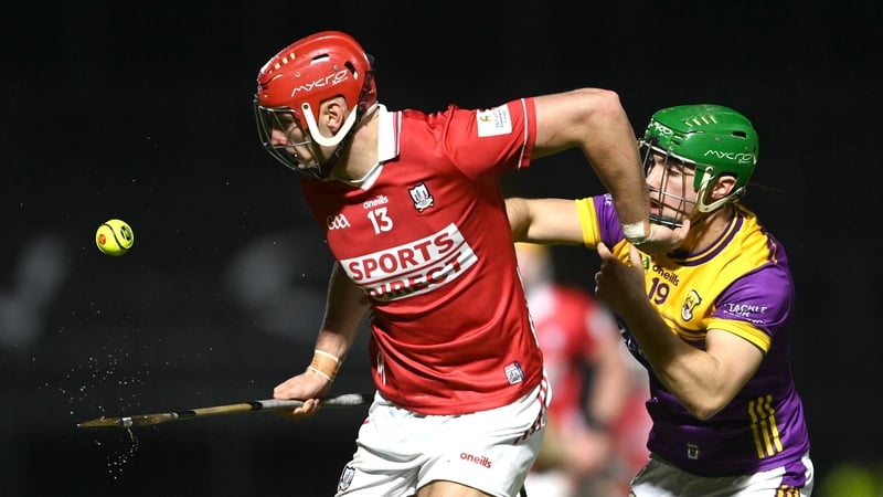 Cork's Brian Hayes holds off Richie Lawlor of Wexford