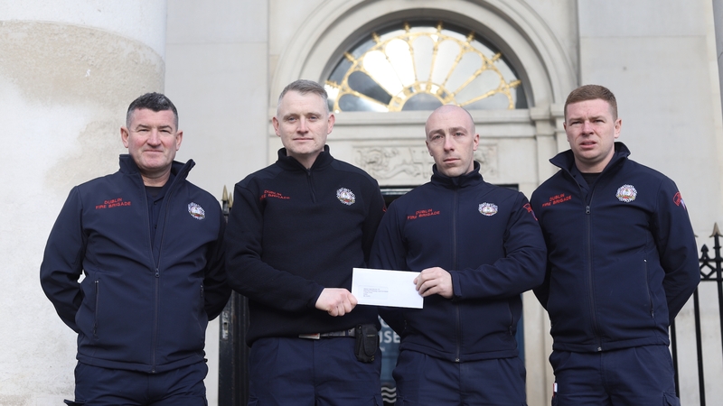 Dublin Fire Brigade Firefighters and SIPTU members Tom Larkin, Martin Hunt, Darren Whelan and Derek Baitson.