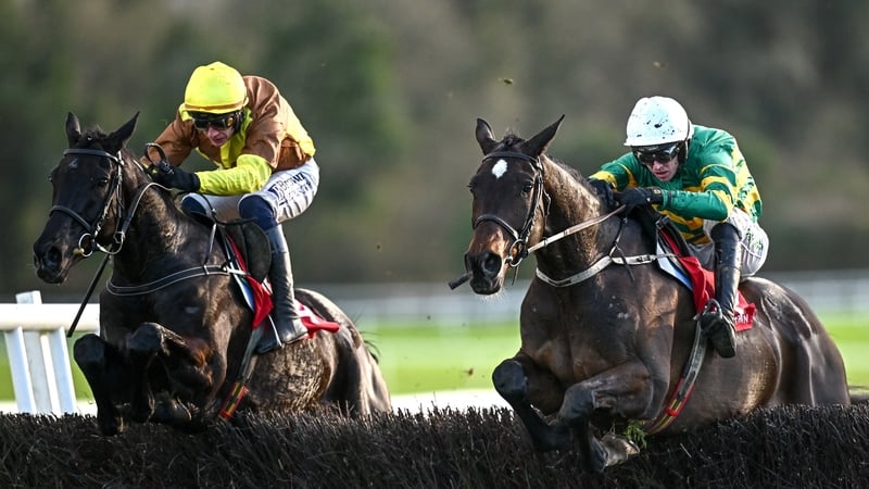 Fact To File, right, with Mark Walsh up, jumps the last on their way to winning the John Durkan Chase from eventual third place Galopin Des Champs