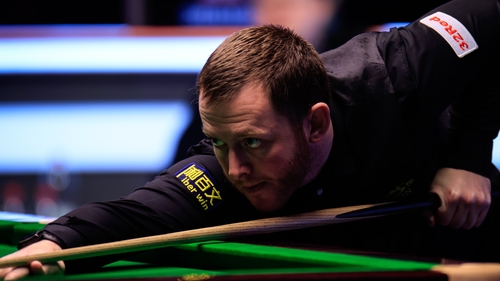Mark Allen fought back to secure his place in the second round