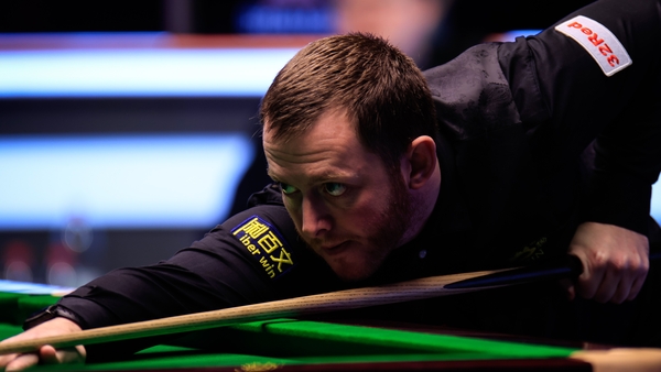 Mark Allen fought back to secure his place in the second round