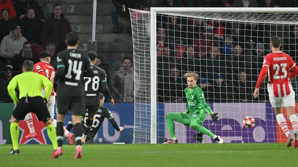 A deflected effort beats Caoimhín Kelleher in the Liverpool goal for PSV Eindhoven's decisive third goal of the night