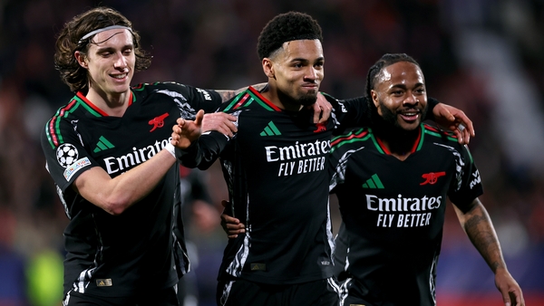 Arsenal's Ethan Nwaneri is flanked by team-mates Riccardo Calafiori and Raheem Sterling as he celebrates his goal against Girona