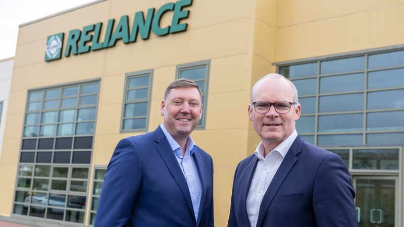 Simon Coveney and Peter Creighton, the CEO of Reliance