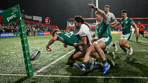 Ireland's Charlie Molony loses possession short of the try line after being tackled by England's Josh Bellamy