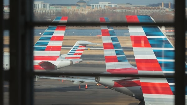 American Airlines said it expects full-year adjusted profit per share in the range of 65 cents to 95 cents, a sharp turnaround from its July forecast of a 20-cent loss to an 80-cent profit