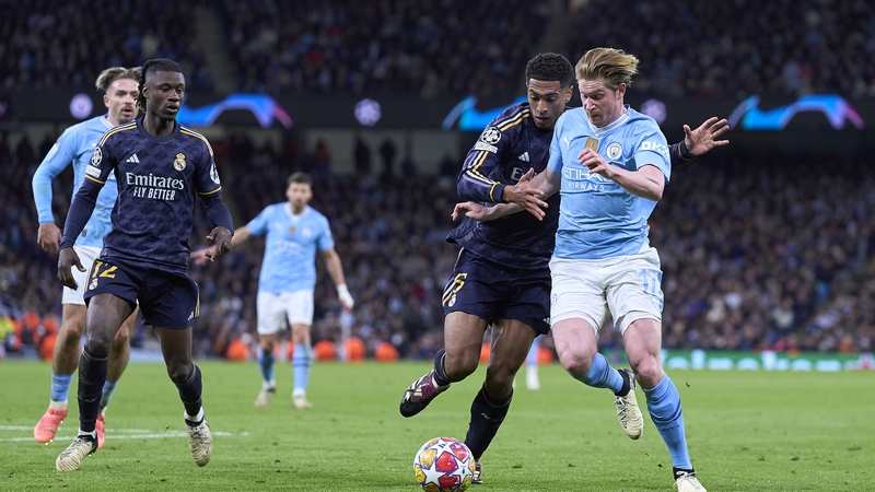 Real Madrid's Jude Bellingham challenges Kevin De Bruyne of Manchester City during last year's Champions League quarter-final