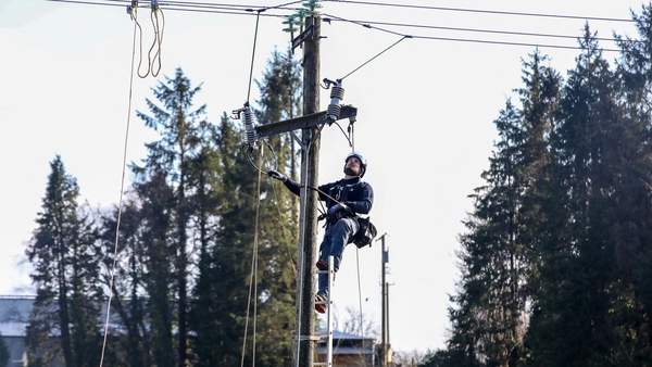 Engineers from French energy company Enedis worked power lines damaged during Storm Éowyn, on the outskirts of Carrick-On-Shannon, Co Leitrim earlier in the week