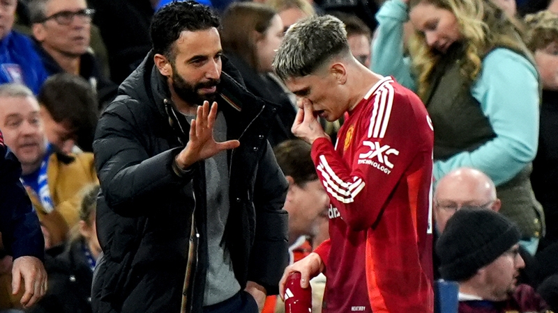 Manchester United manager Ruben Amorim (L) speaking to Alejandro Garnacho in November