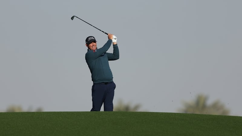 Pádraig Harrington plays his second shot on the 14th hole at Royal Golf Club in Bahrain