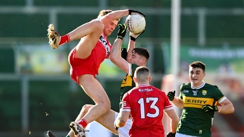 Anton Tohill of Derry rises highest to win possession in Celtic Park