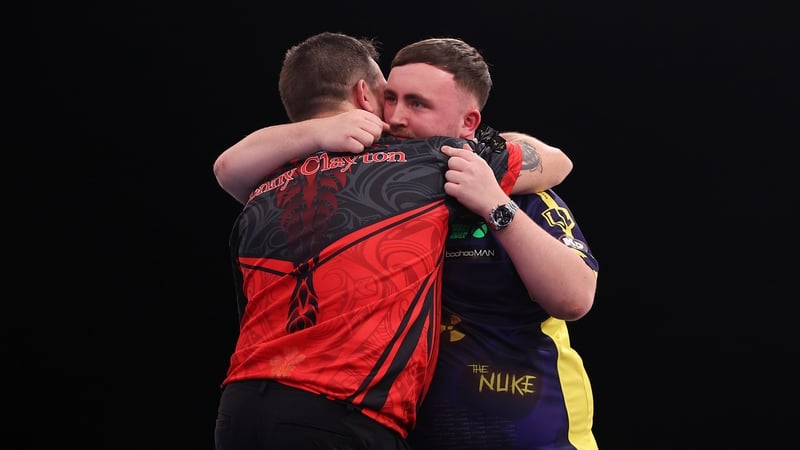 Clayton and Littler embrace after their match