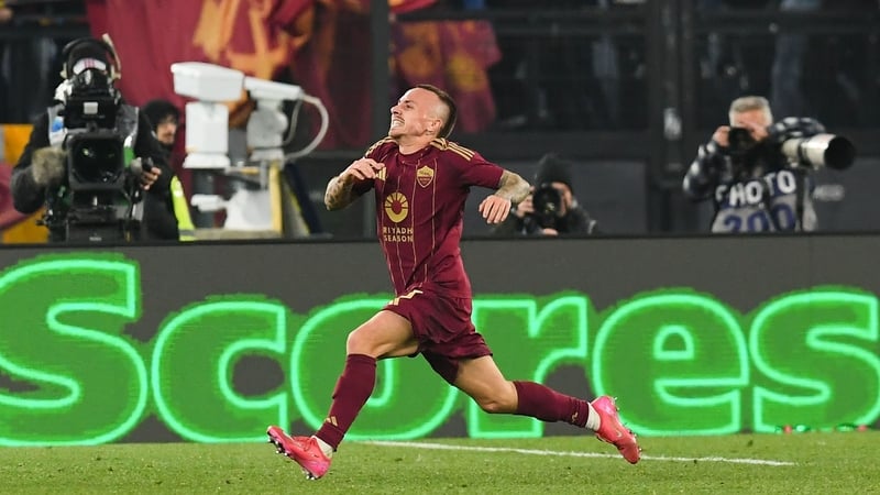 Angelino celebrates scoring his first Roma goal in the club's draw with Napoli