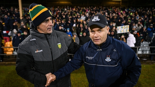 Donegal boss Jim McGuinness (L) has sympathy for Dublin counterpart Dessie Farrell