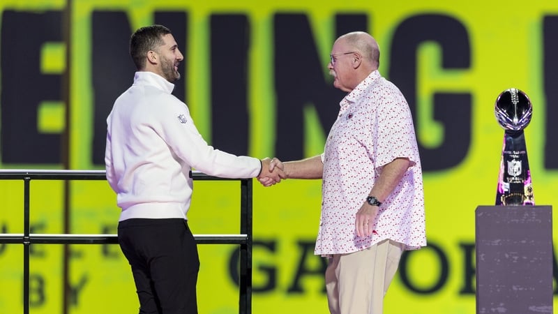 Nick Sirianni of the Philadelphia Eagles and Andy Reid of the Kansas City Chiefs meet on stage during Super Bowl LIX Opening Night at Caesars Superdome in New Orleans