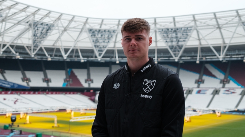Evan Ferguson poses at the London Stadium after his signing