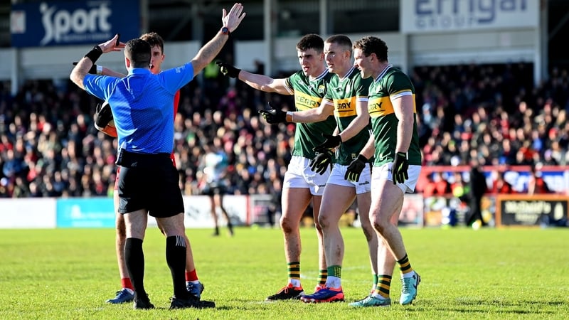 Referee Martin McNally explains a decision to Kerry players Seán O'Shea, Jason Foley and Tadhg Morley at Celtic Park on Sunday