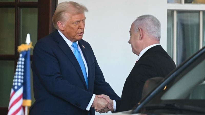 US President Donald Trump greets Israel's Prime Minister Benjamin Netanyahu as he arrives at the North Portico of the White House