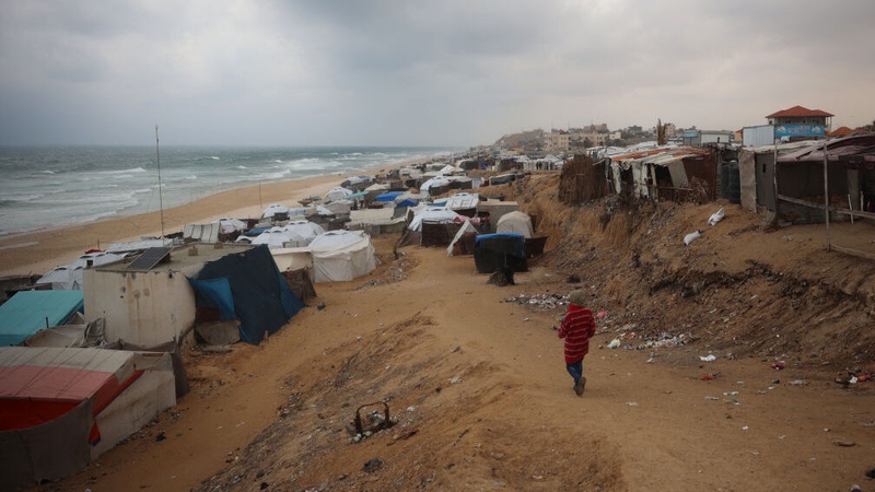 Displaced Palestinians camp along the shore at Deir al-Balah - Donald Trump said Gaza has the potential to be 'the Riviera of the Middle East'
