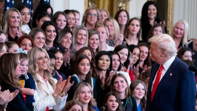 US President Donald Trump greets attendees before signing the 'No Men in Women's Sports' executive order