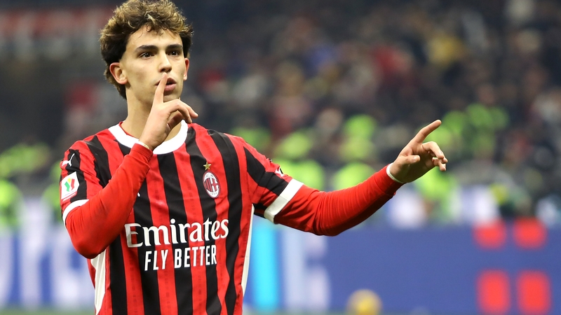 Joao Felix celebrates after scoring AC Milan's third goal