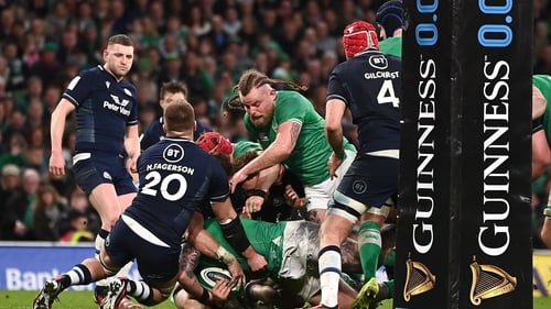 Andrew Porter dives over to score a try against Scotland last year with Finlay Bealham (centre) in support