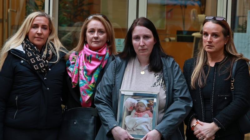 Ceire Foran, mother of baby Rú Foran, (C) outside the Dublin District Coroner's Court