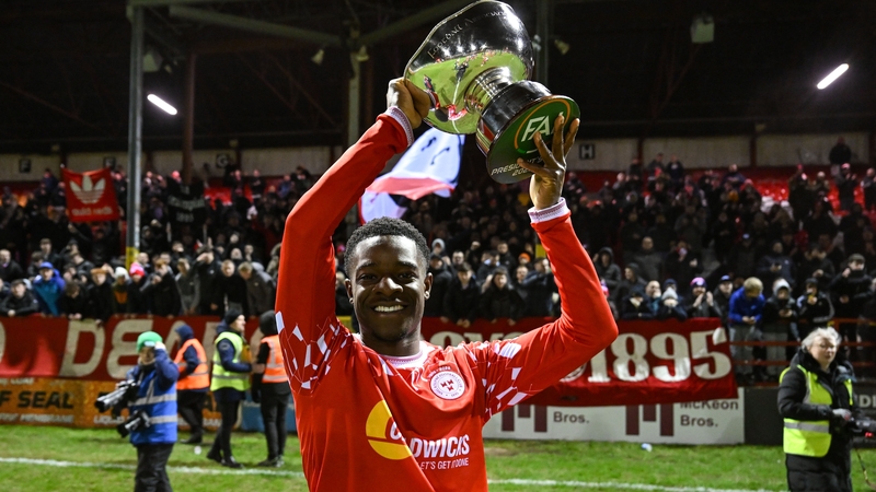 Mipo Odubeko celebrates with the President's Cup