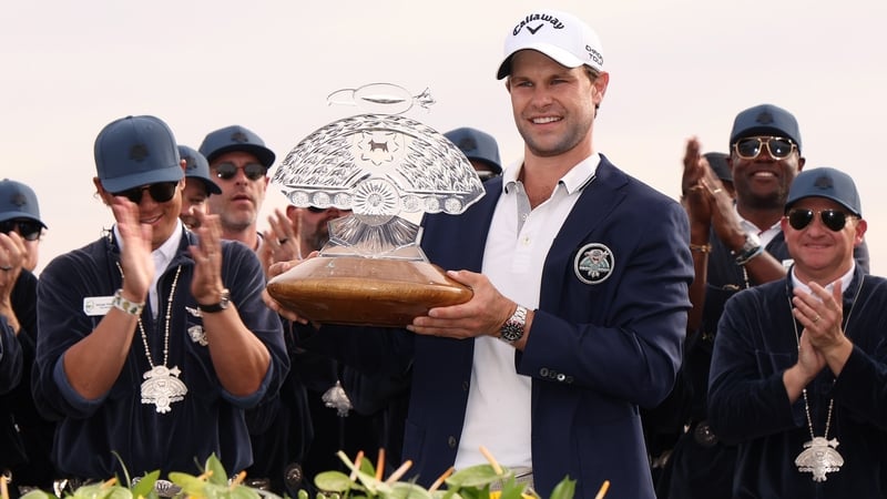 Thomas Detry poses with the trophy after at TPC Scottsdale