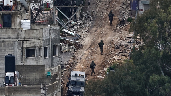 Israeli forces conduct a raid in the Nur Shams camp for Palestinian refugees near Tulkarem in the occupied West Bank