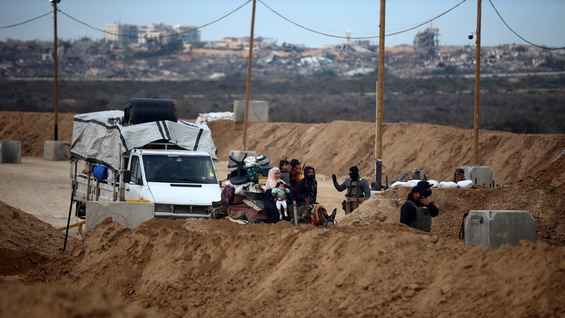 Displaced Palestinians make their way from southern to northern Gaza