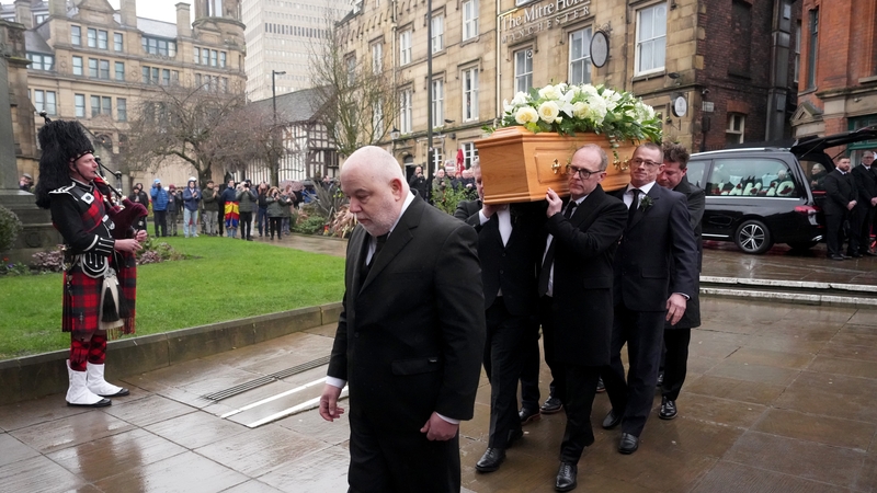 The coffin of the late Manchester United and Scotland star Denis Law is carried into Manchester Cathedral