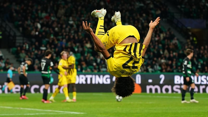 Borussia Dortmund's Karim Adeyemi celebrates his goal against Sporting Lisbon
