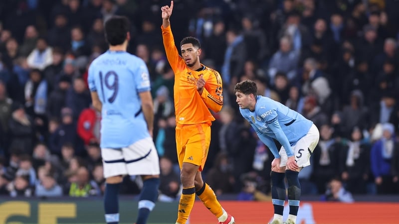Real Madrid's Jude Bellingham reacts after claiming the fifth and decisive goal of the game at the Etihad Stadium