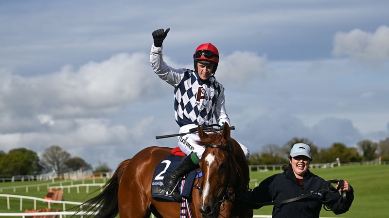 JJ Slevin celebrates on Banbridge after winning the Champion Chase at the 2024 Punchestown Festival