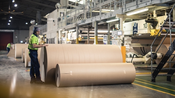 Reels of paper at a Smurfit Westrock plant, the biggest cardboard box maker