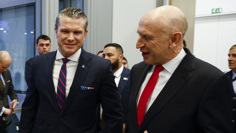 US Defense Secretary Pete Hegseth (L) and British Defence Secretary John Healey meet in Brussels ahead of a meeting of NATO defence ministers
