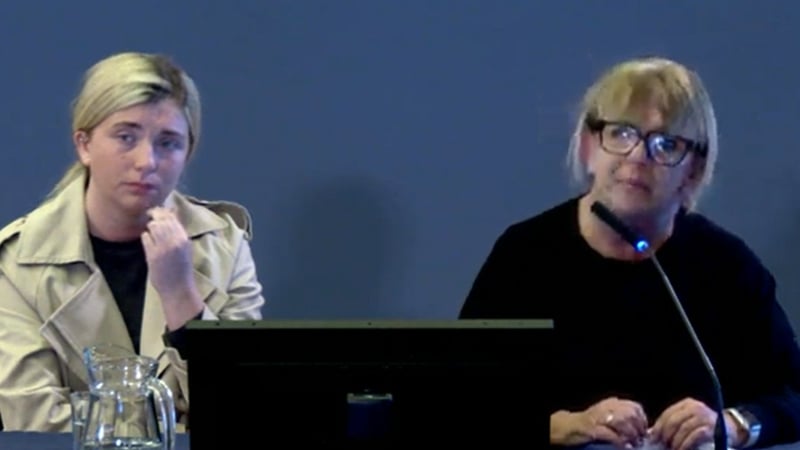 Niamh KcKinney (L) accompanied her mother Caroline McKinney as she gave evidence at the Omagh Bombing Inquiry