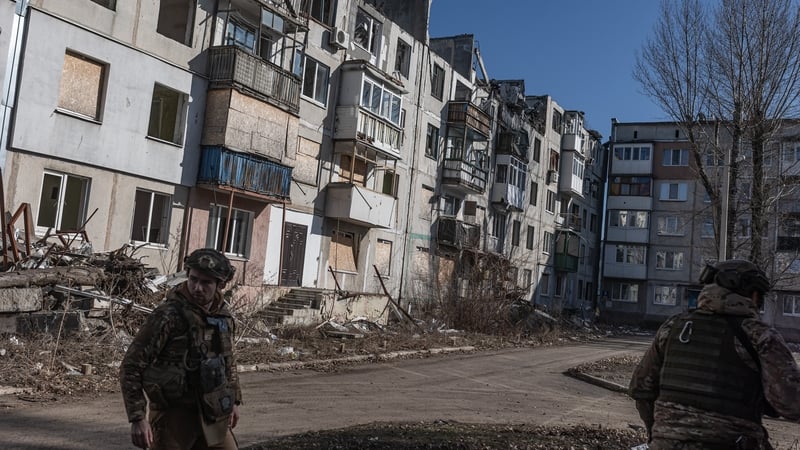 Police and volunteers evacuate civilians from the city of Pokrovsk, which is about 3km from the front line, in Ukraine