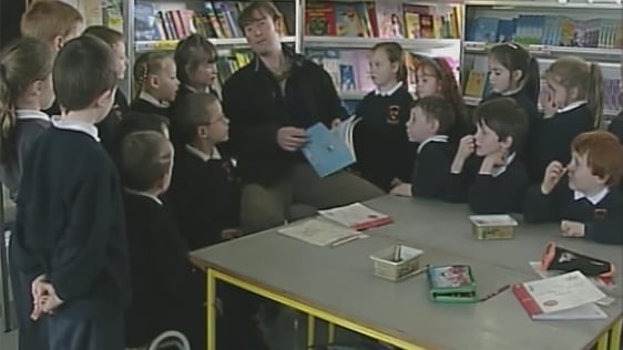 Pupils of Aughnasheelin National School in County Leturim with Booker Prize-winning author DBC Pier…