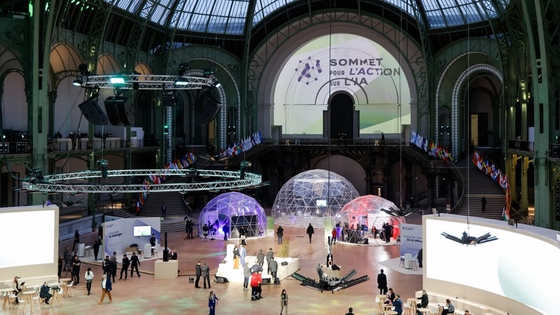 People take part in the Artificial Intelligence (AI) Action Summit, at the Grand Palais, in the French capital