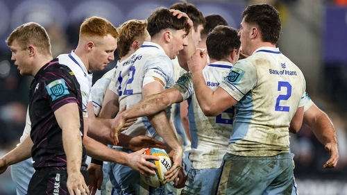 Charlie Tector is congratluated by team-mates after scoring Leinster's second try against Ospreys
