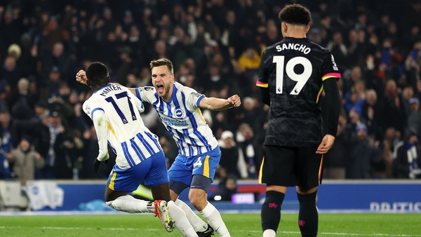 Brighton's Yankuba Minteh celebrates his goal with team-mate Joel Veltman