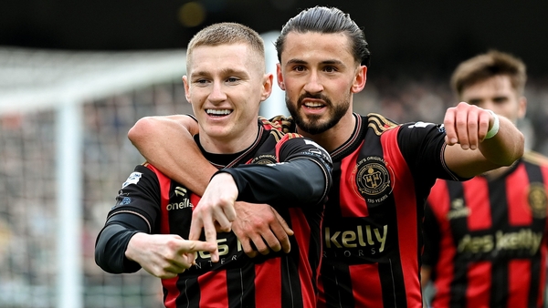 Ross Tierney celebrates his goal with team-mate Connor Parsons (r) who played a large part in the build up