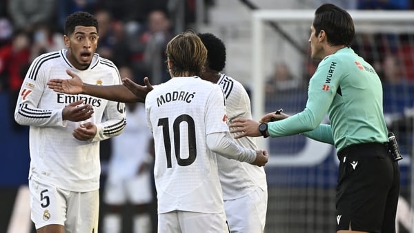 Jude Bellingham (L) was aghast after being sent off by referee Munuera Montero