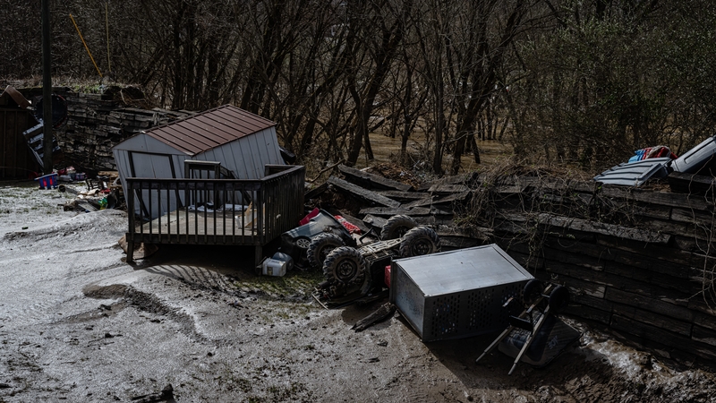 A broken flood wall where mud and floodwaters poured through is seen at Ramsey Mobile Home Park in Pikeville, Kentucky