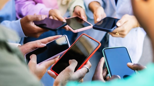 Children browsing on mobile phones
