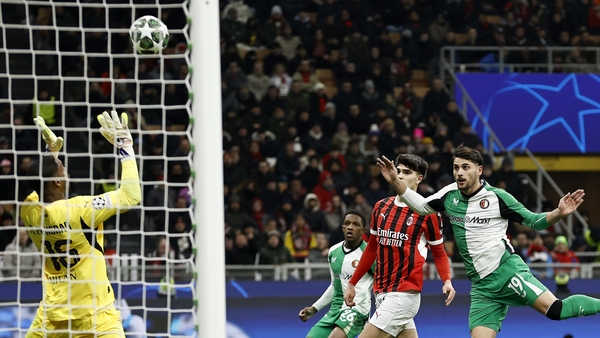 Julian Carranza heads home for Feyenoord against AC Milan