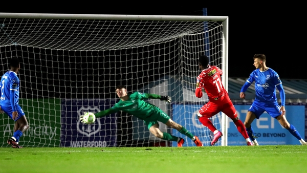 Mipo Odubeko beats Stephen McMullan in the Waterford goal
