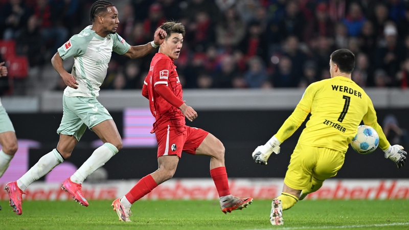 Ritsu Doan (C) scores Freiburg's fifth goal